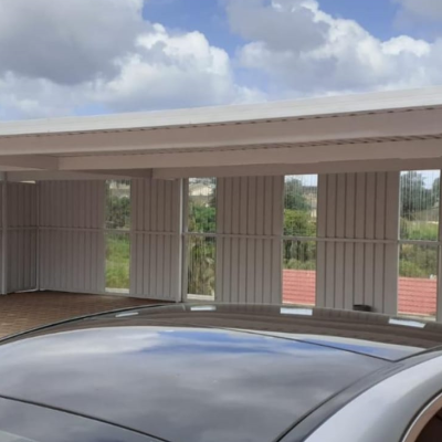 Encloses Carport